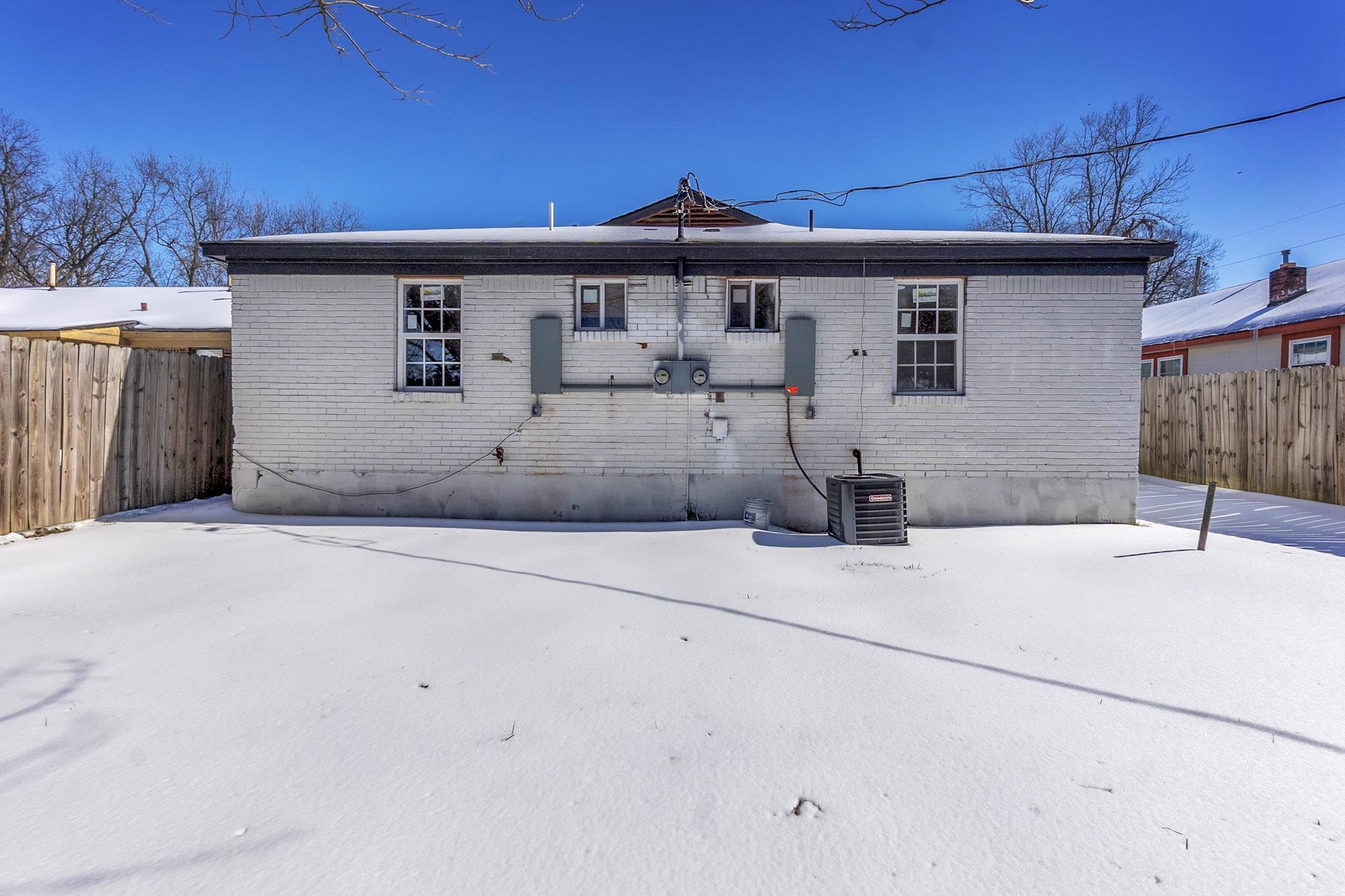 375 Pope Street Memphis, TN 38112 - Photo 19 of 19 Rear view of house featuring brick siding