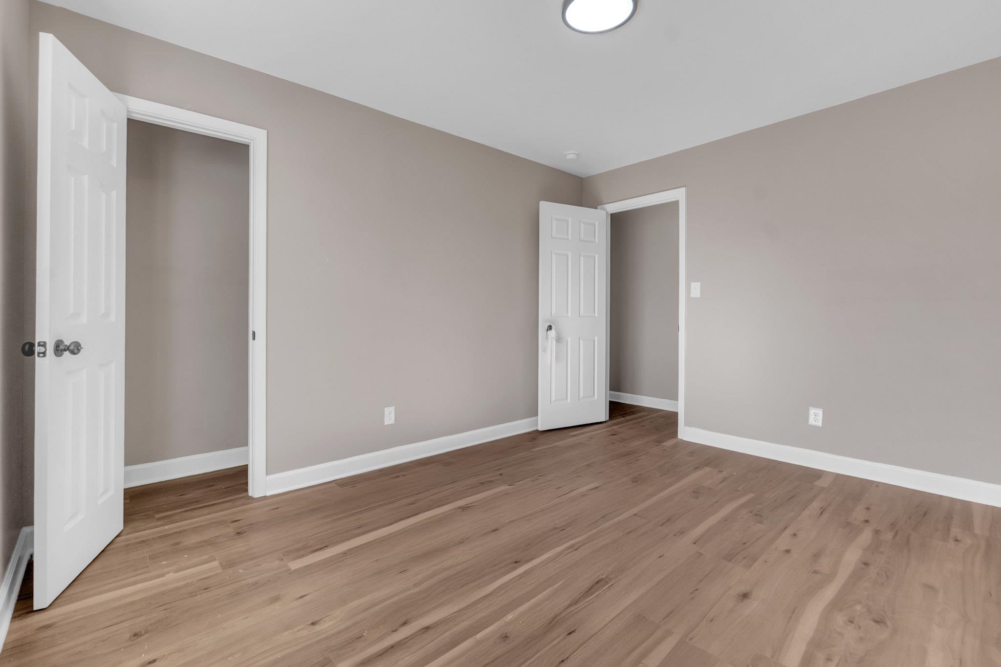 375 Pope Street Memphis, TN 38112 - Photo 7 of 19 Unfurnished bedroom with light wood-type flooring