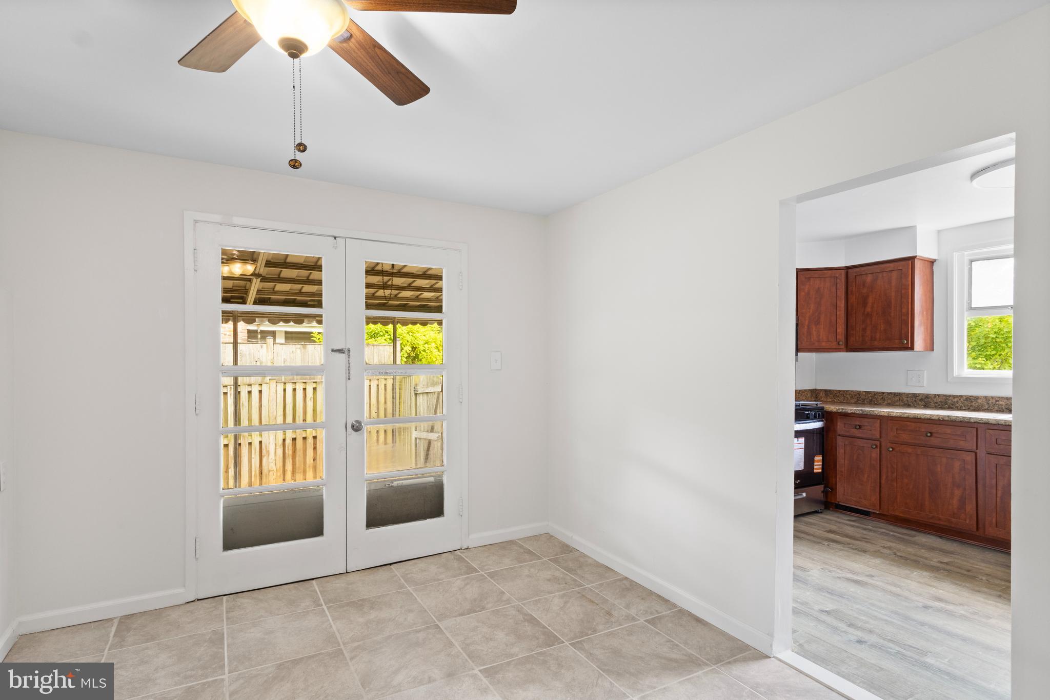 2302 Veirs Mill Road Rockville, MD 20851 - Photo 18 of 34 Dining Room with French doors to patio