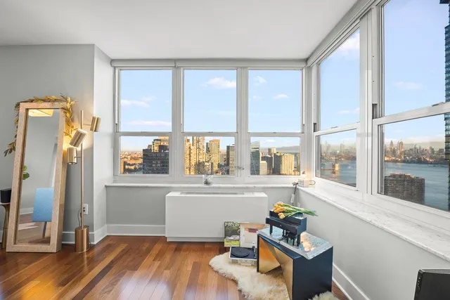 a kitchen with stainless steel appliances granite countertop a refrigerator and a stove