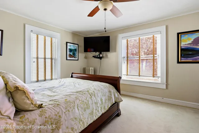 a view of a hallway with washer and dryer