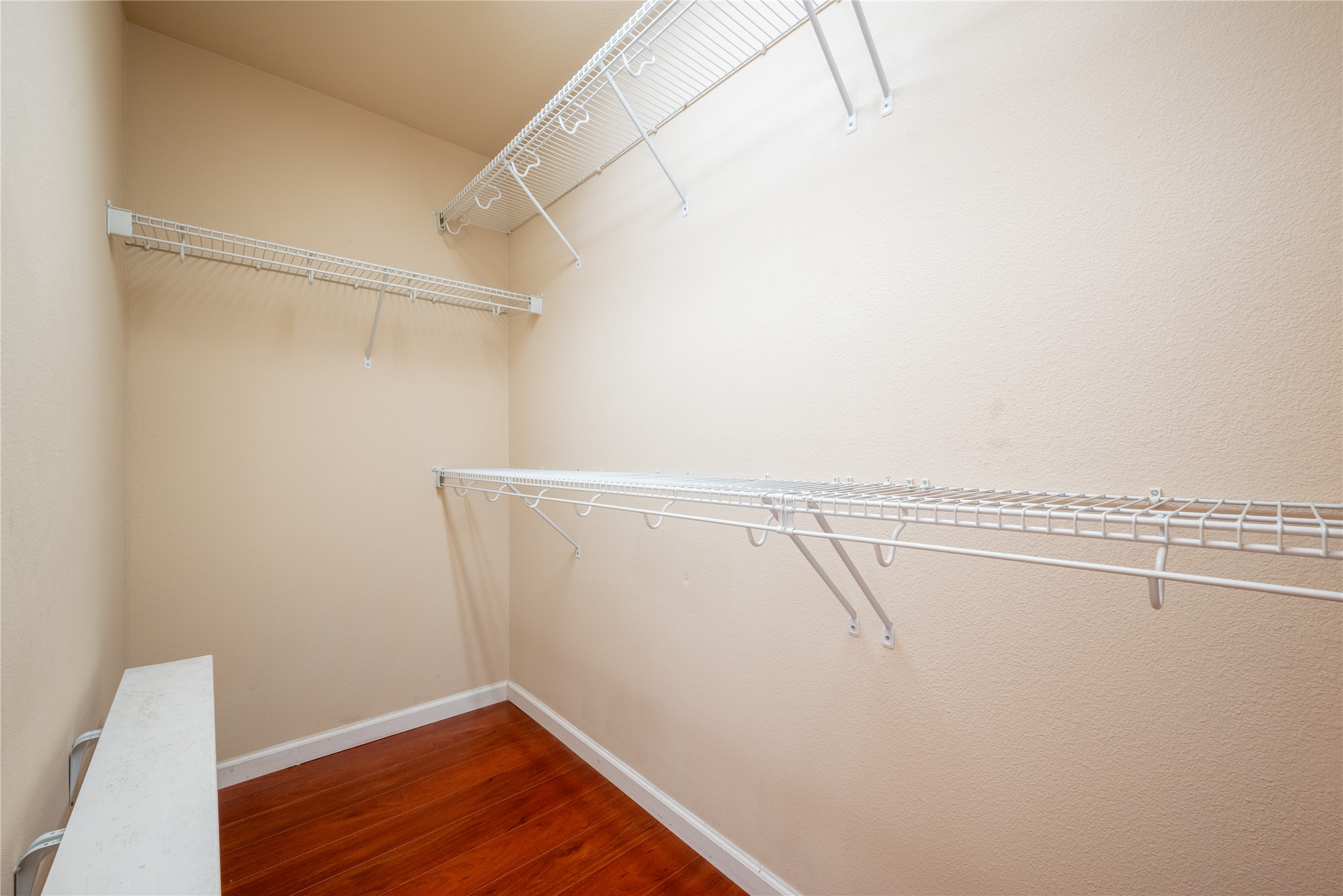 23823 Pebworth Place Spring, TX 77373 - Photo 16 of 31 a view of a room with racks on the wall