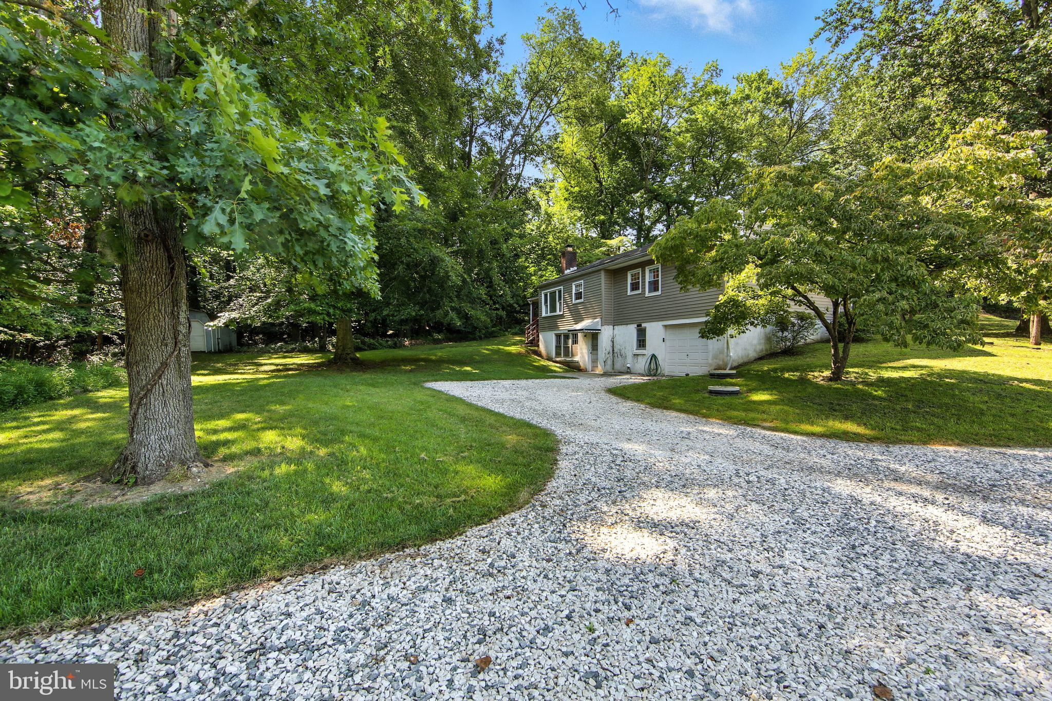 812 Mennonite Road Royersford, PA 19468 - Photo 4 of 35 Stone driveway to back of house