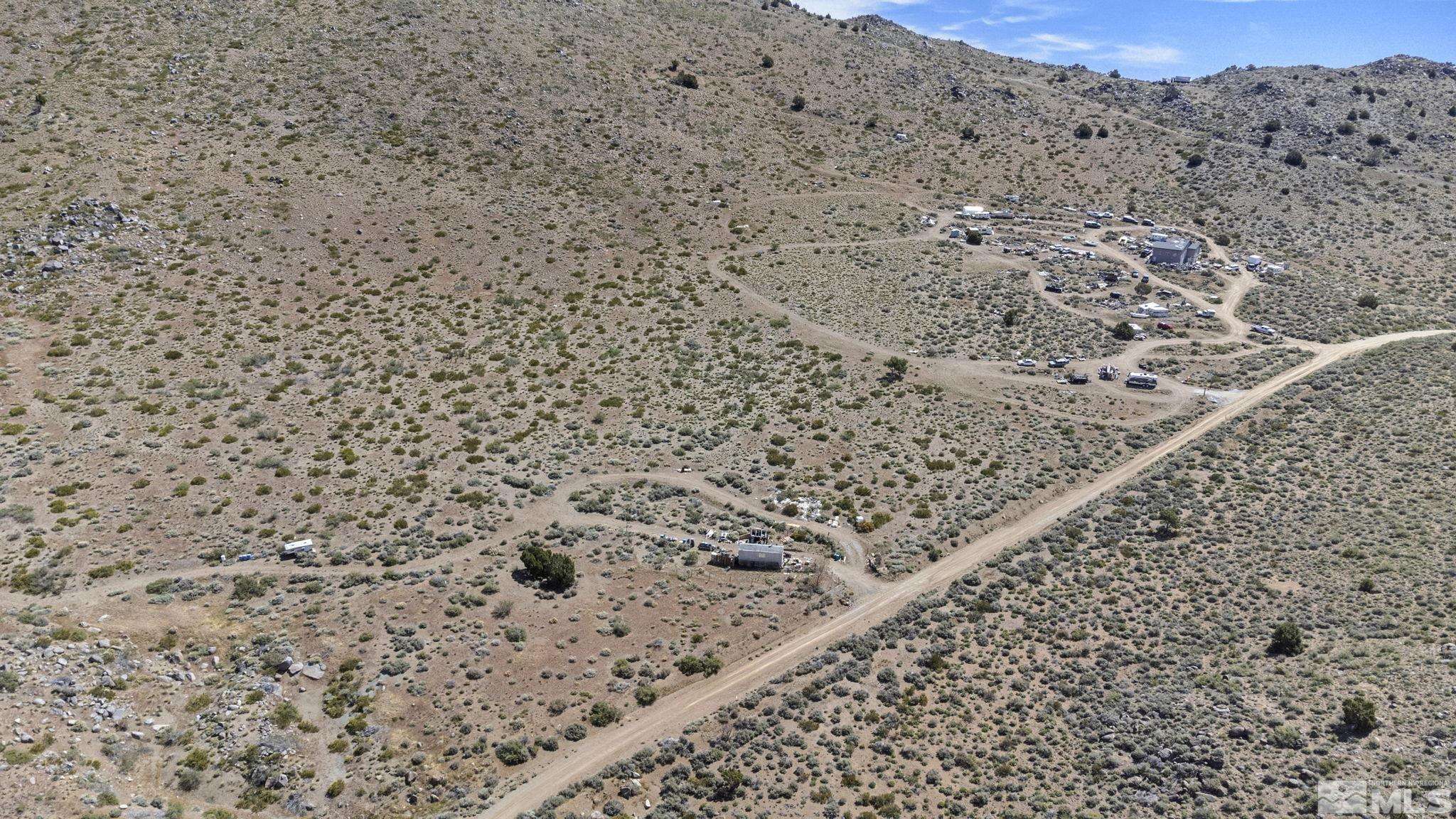 1305 Freds Mountain Road Reno, NV 89508 - Photo 1 of 8 view of a dry yard