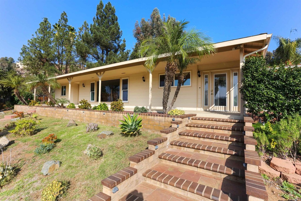 1188 Crystal Lane El Cajon, CA 92020 - Photo 2 of 26 a front view of house with yard and trees around