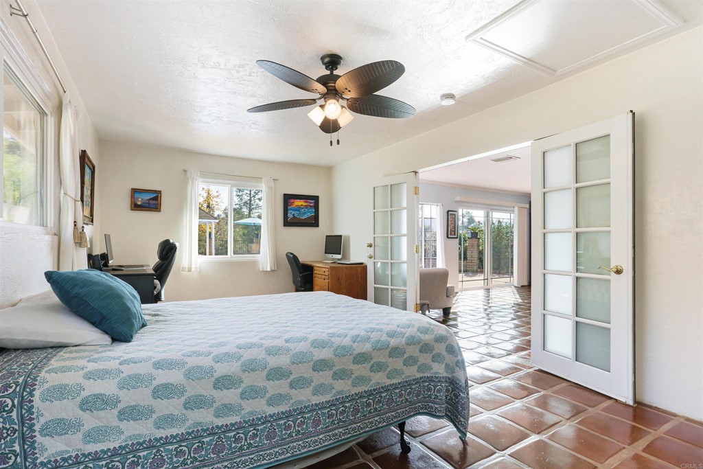 1188 Crystal Lane El Cajon, CA 92020 - Photo 11 of 26 a bedroom with a bed and window