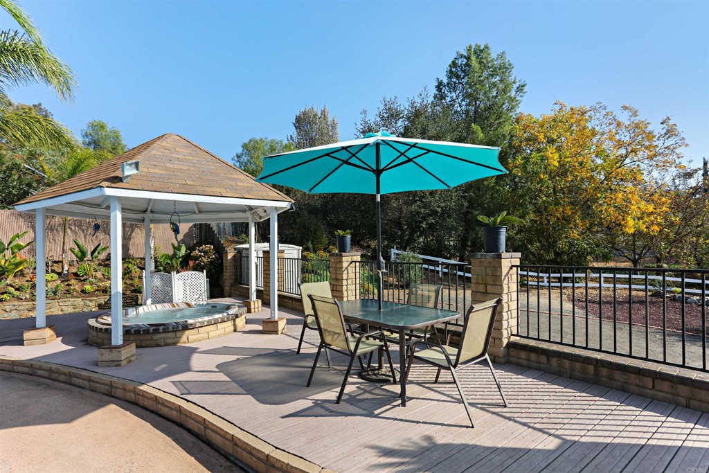 1188 Crystal Lane El Cajon, CA 92020 - Photo 23 of 26 a patio with a patio table and chairs