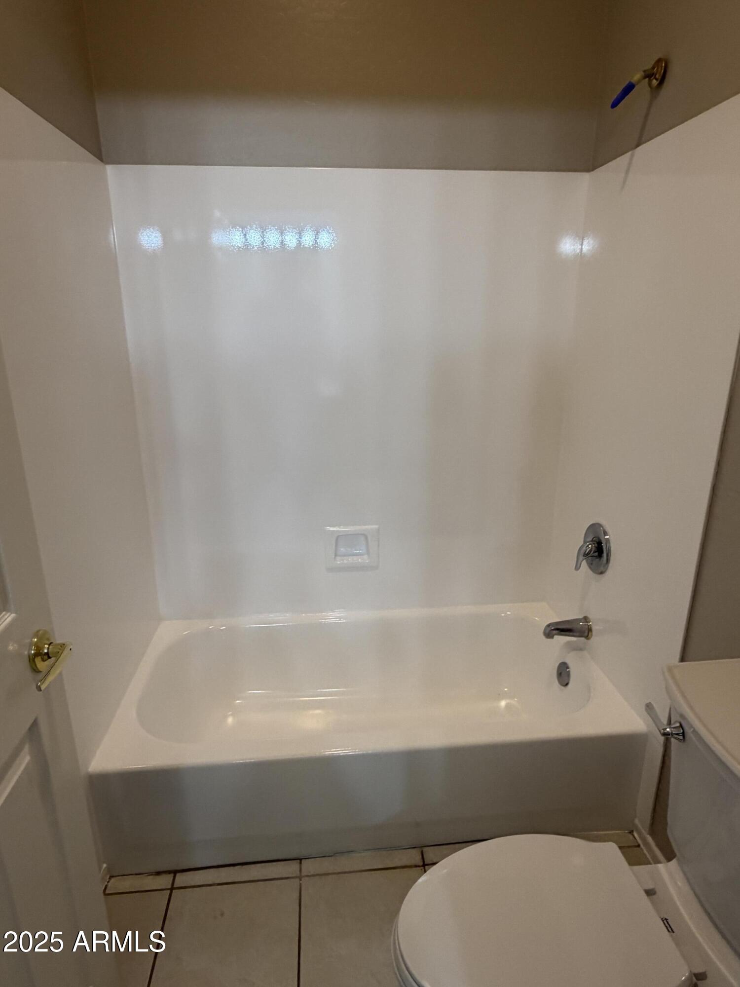 231 East Krista Way Tempe, AZ 85284 - Photo 12 of 20 a bathroom with a toilet and a bathtub