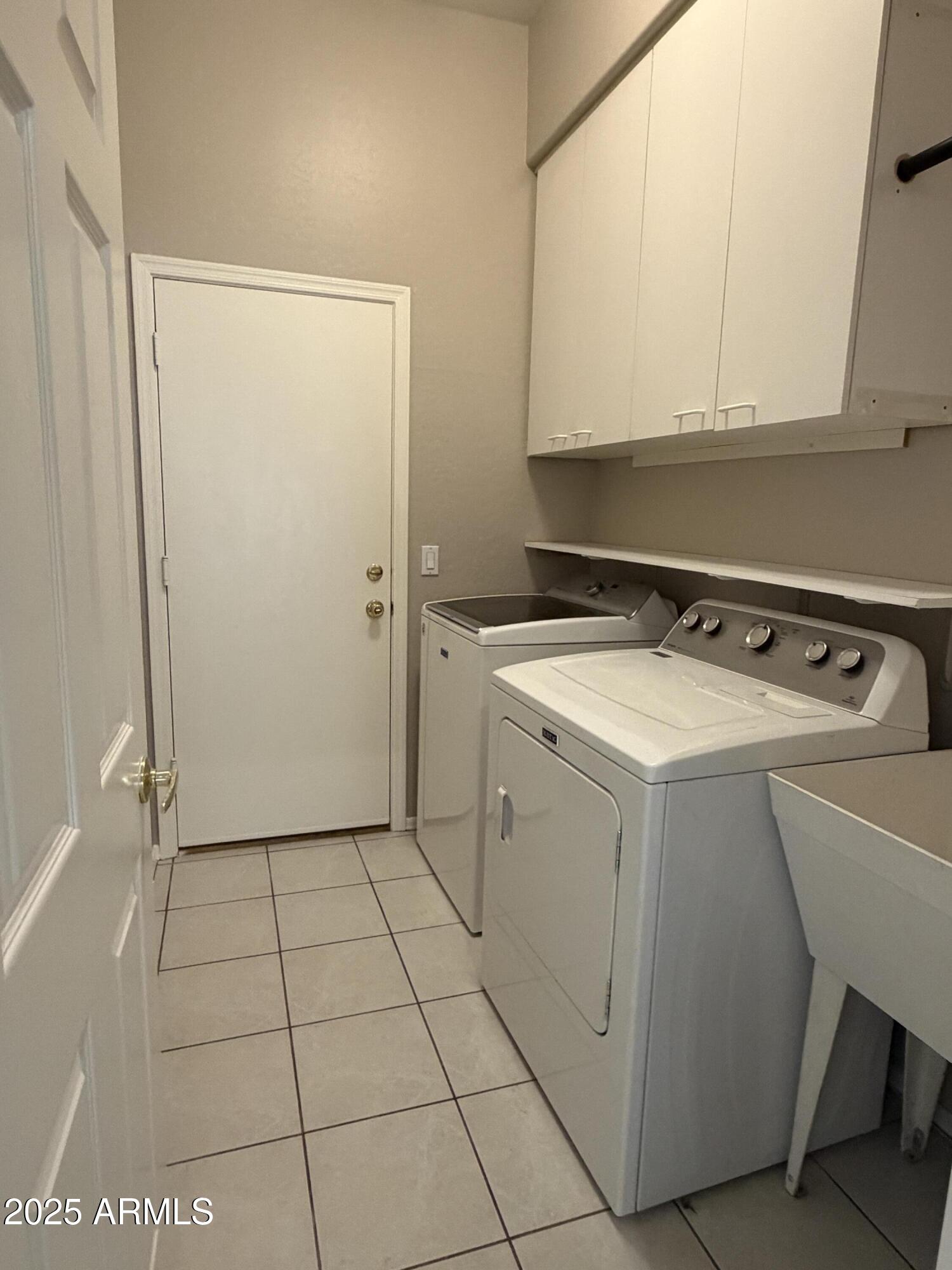 231 East Krista Way Tempe, AZ 85284 - Photo 14 of 20 a utility room with dryer and washer