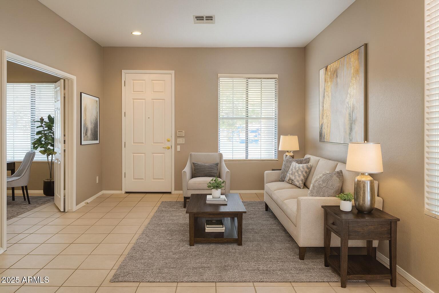 231 East Krista Way Tempe, AZ 85284 - Photo 2 of 20 a living room with furniture and wooden floor
