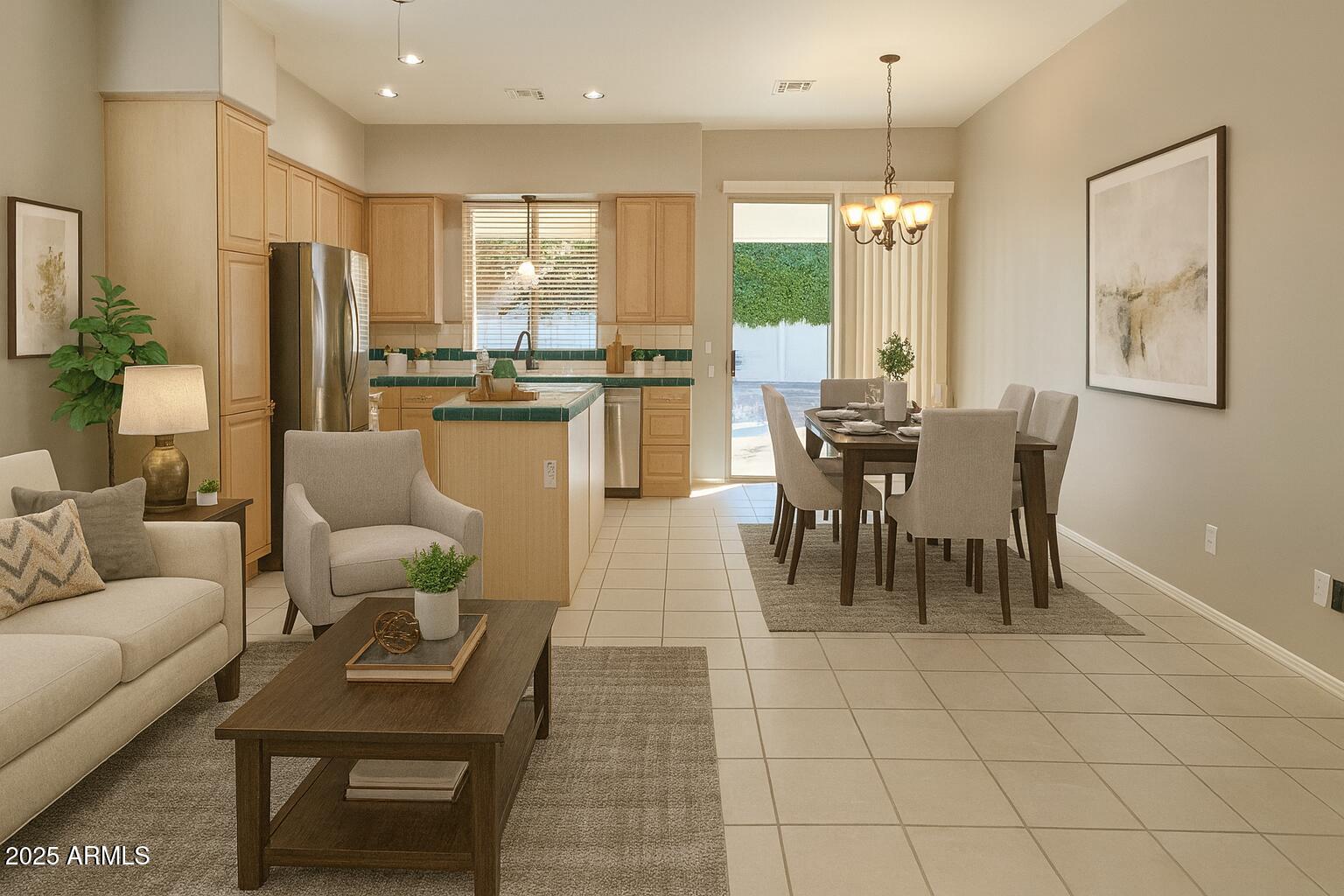 231 East Krista Way Tempe, AZ 85284 - Photo 4 of 20 a dining hall with stainless steel appliances kitchen island granite countertop a dining table chairs and a refrigerator