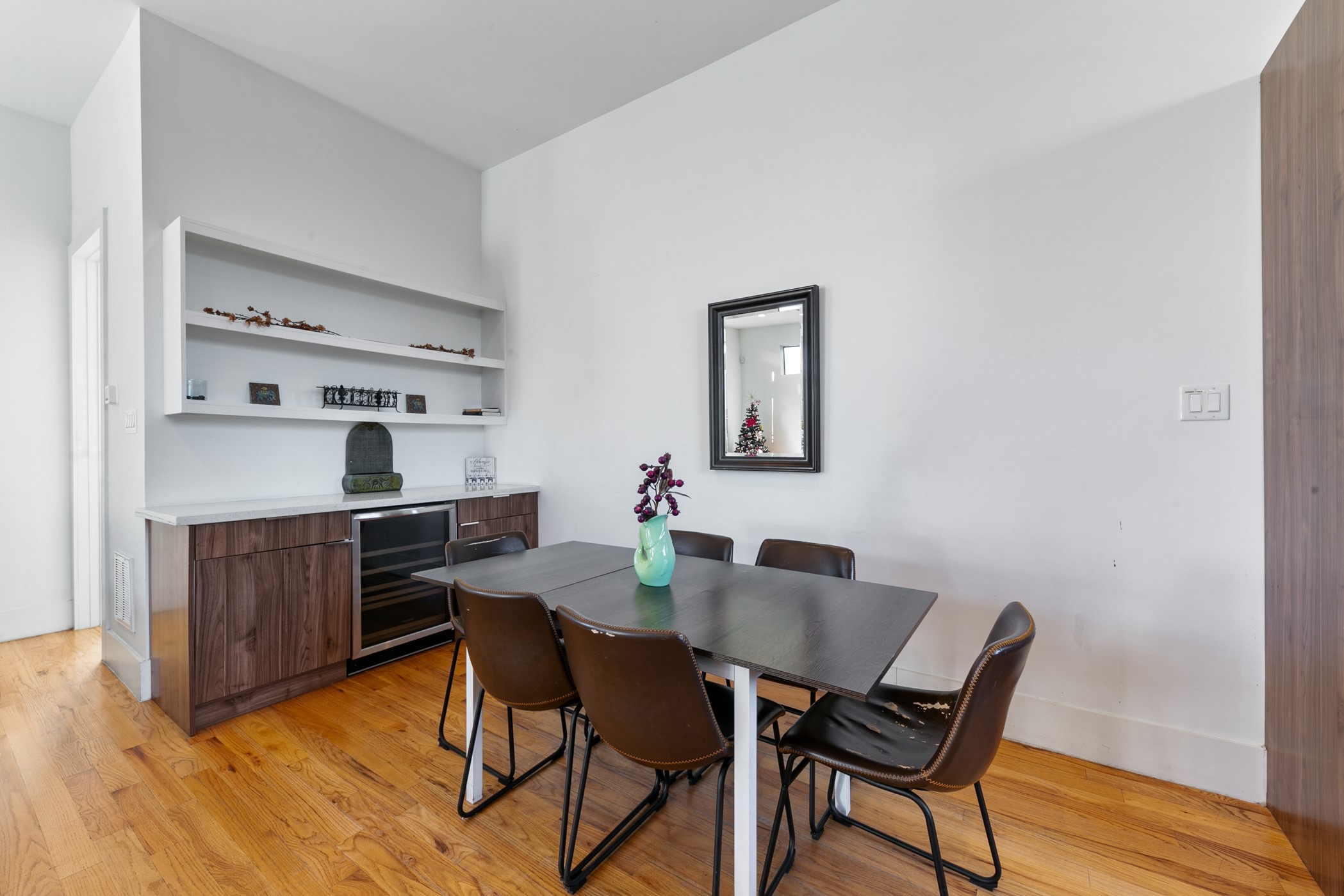 604 Oakley Street Houston, TX 77006 - Photo 17 of 38 Built in buffet and wine fridge in the dining room for stylish storage and effortless entertaining.