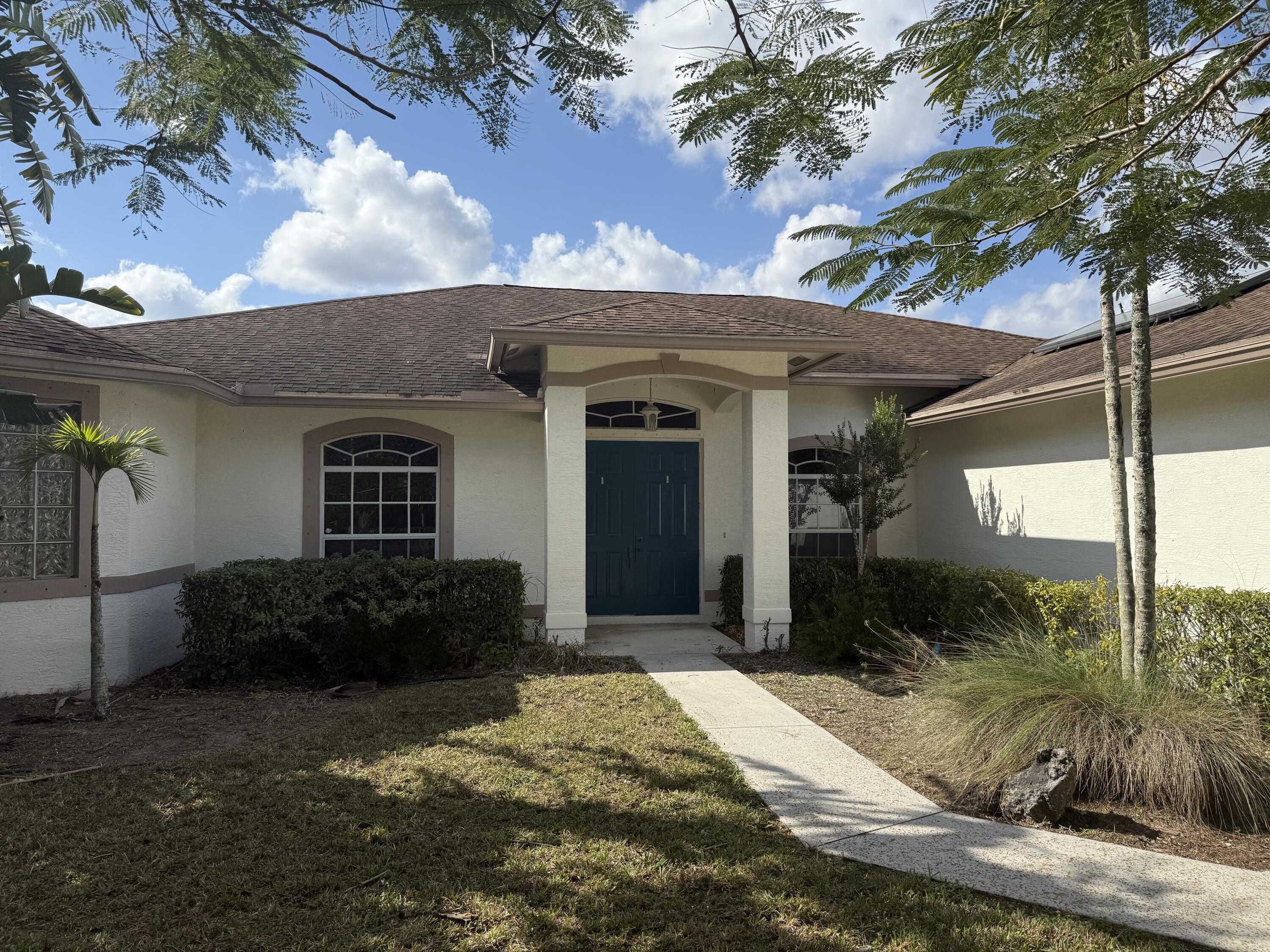15119 98th Trail North Jupiter, FL 33478 - Photo 1 of 51 Exterior Front