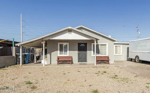 a front view of a house with a patio