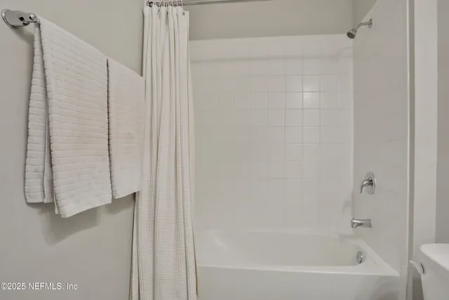 a bathroom with a bathtub