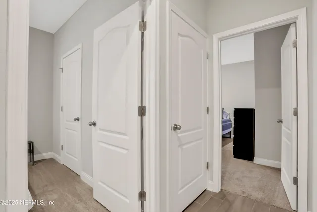 a view of a hallway with an empty room