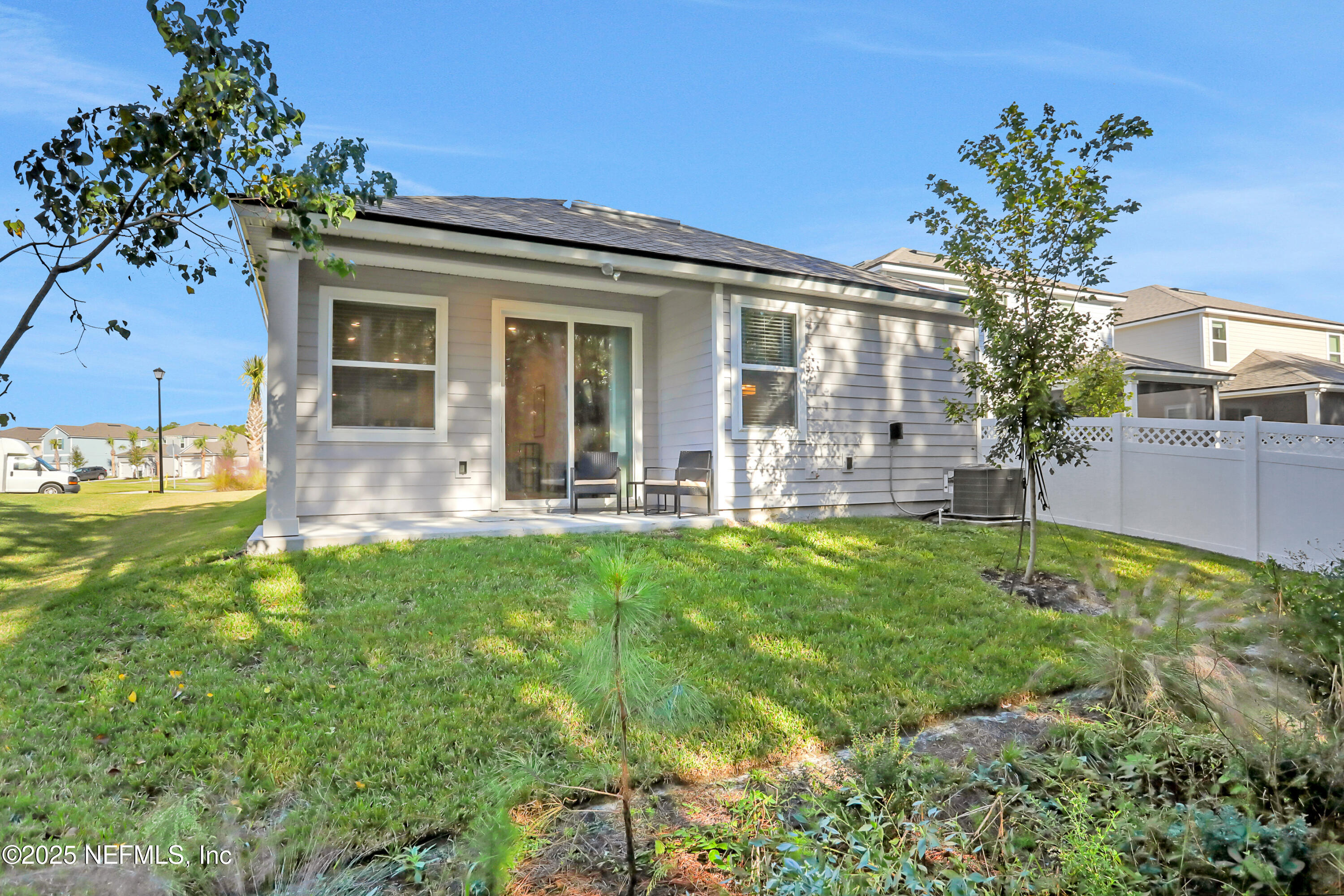 404 Thistleton Way St. Augustine, FL 32092 - Photo 33 of 35 front view of a house with a yard