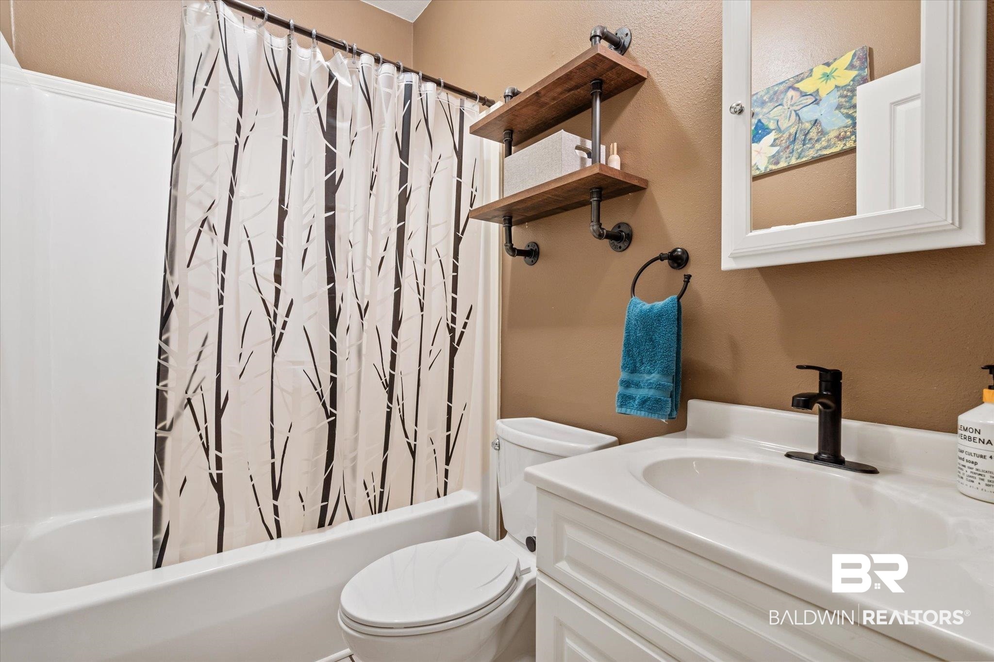 72 Limestone Drive Jackson, AL 36545 - Photo 16 of 38 Full bathroom featuring shower / bath combination with curtain, toilet, and vanity
