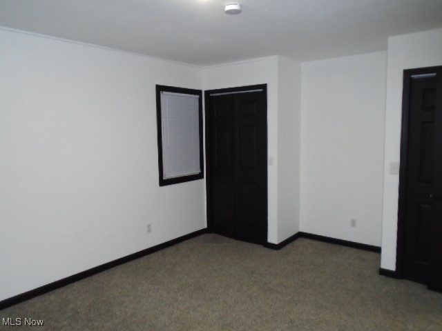 10971 Auburn Road Chardon, OH 44024 - Photo 26 of 40 Unfurnished bedroom featuring a closet and carpet floors