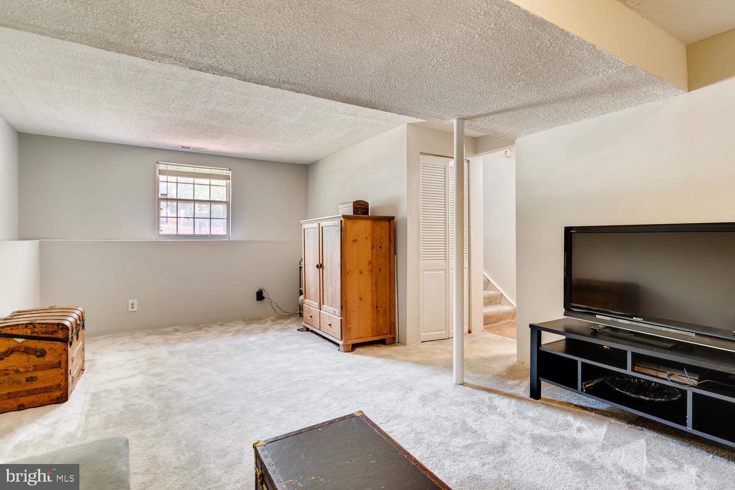 7210 Johnnycake Road Baltimore, MD 21228 - Photo 14 of 28 brightly lit lower level has separate laundry