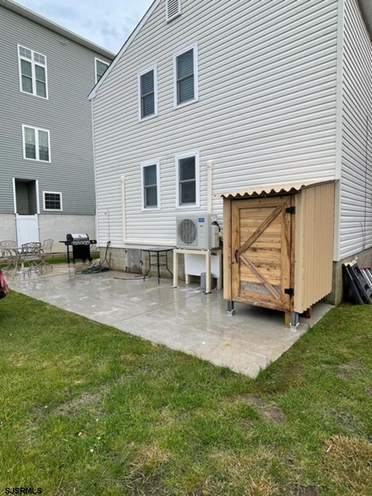111 10th Street South, Unit B Brigantine, NJ 08203 - Photo 15 of 19 a view of a house with a yard