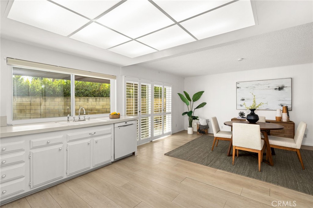 8242 Baldwin Circle Buena Park, CA 90621 - Photo 12 of 44 a living room with furniture and wooden floor