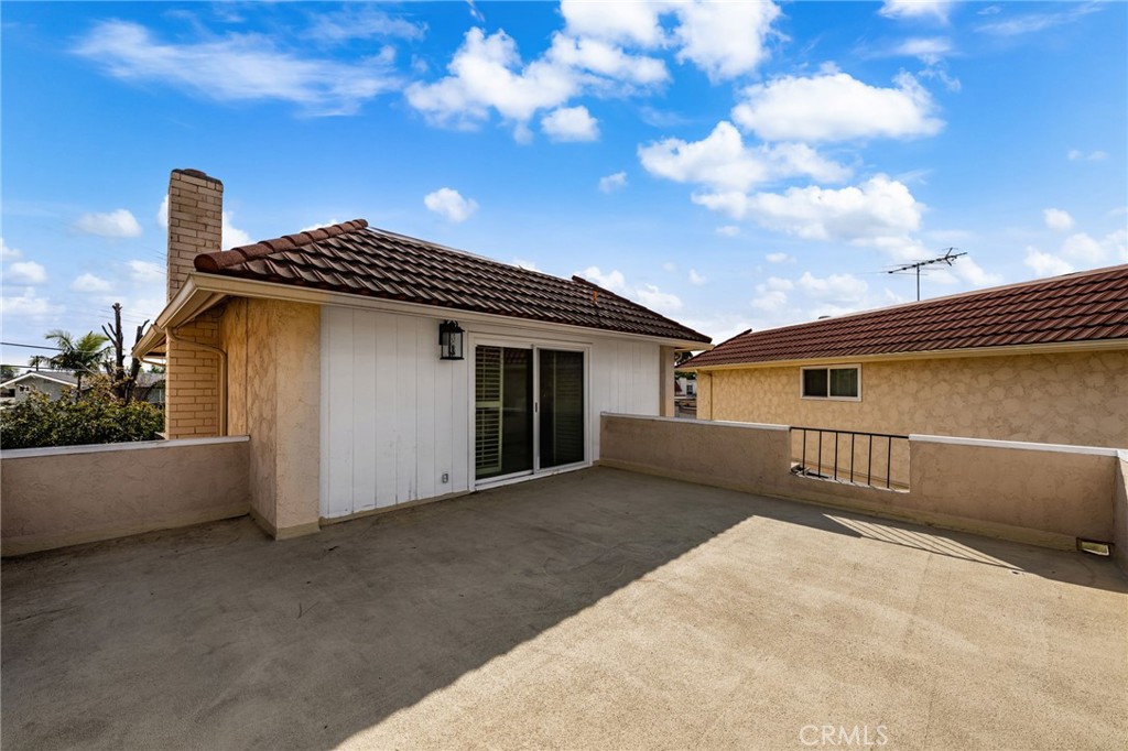 8242 Baldwin Circle Buena Park, CA 90621 - Photo 27 of 44 a view of a house with a yard