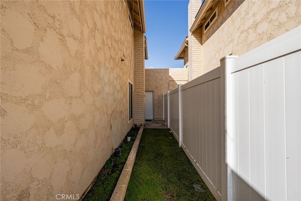 8242 Baldwin Circle Buena Park, CA 90621 - Photo 35 of 44 a view of a pathway of a building