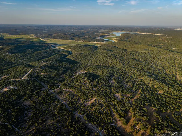 a view of a lake from a yard