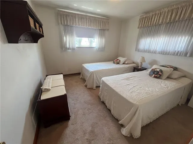 a bathroom with a toilet and a sink