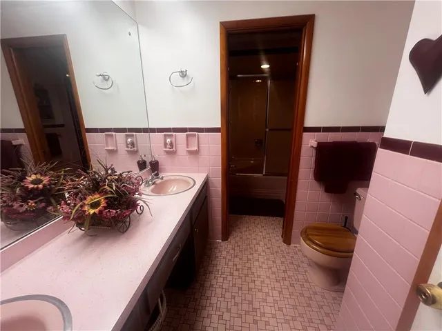 a room with a table and a lamp