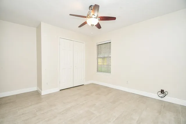 a view of storage and utility room with washer and dryer