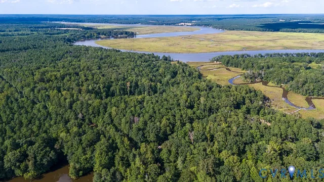 a view of an ocean and a mountain
