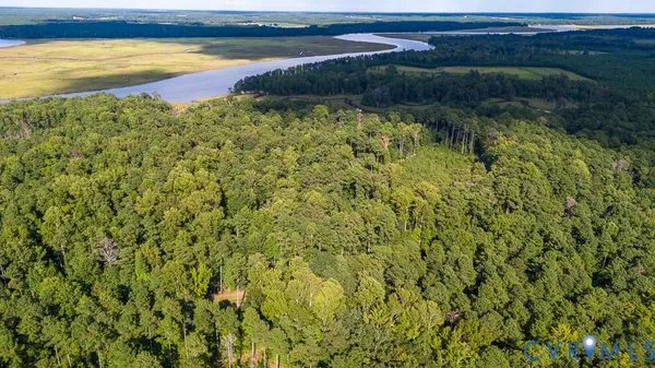 a view of a lake with a yard