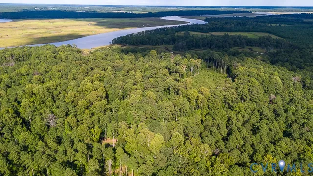 a view of a lake with a yard