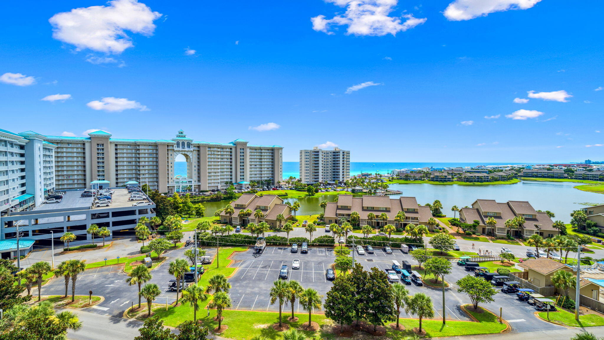 122 Seascape Drive, Unit 902 Miramar Beach, FL 32550 - Photo 1 of 20 a view of a city with lawn chairs