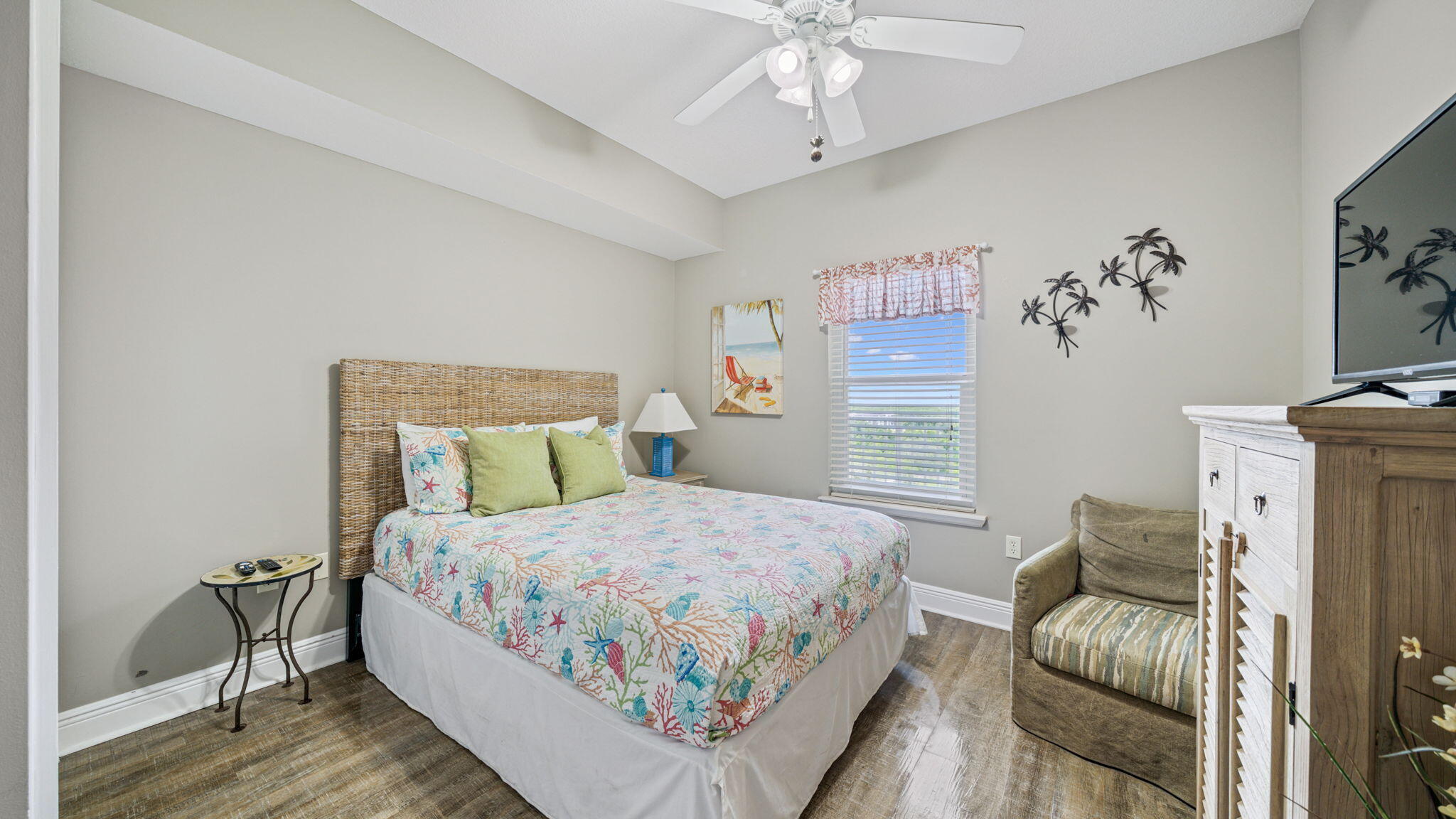 122 Seascape Drive, Unit 902 Miramar Beach, FL 32550 - Photo 3 of 20 a bedroom with a bed and a chandelier