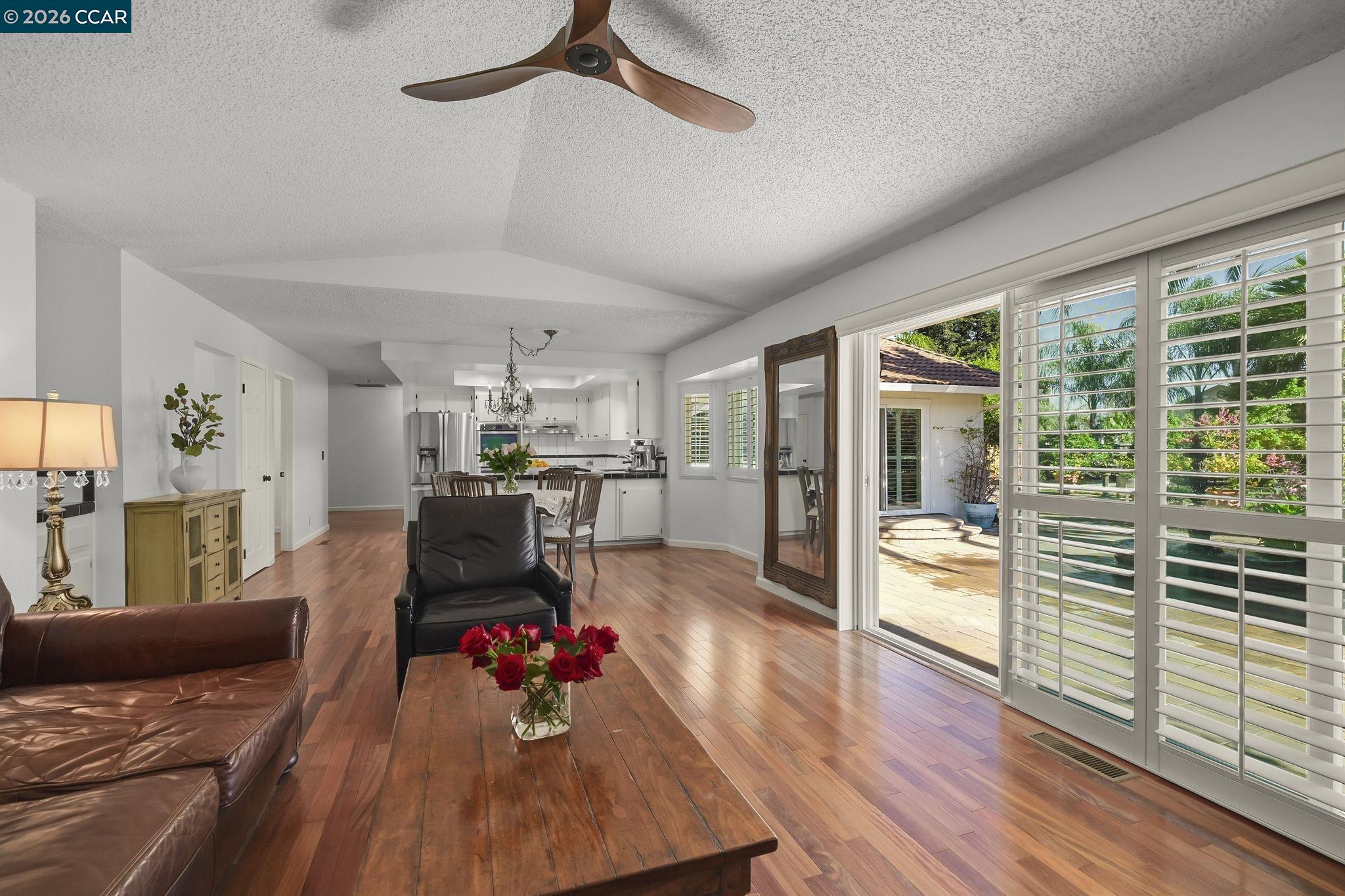 4151 Storey Lane Concord, CA 94518 - Photo 16 of 40 a living room with furniture and wooden floor
