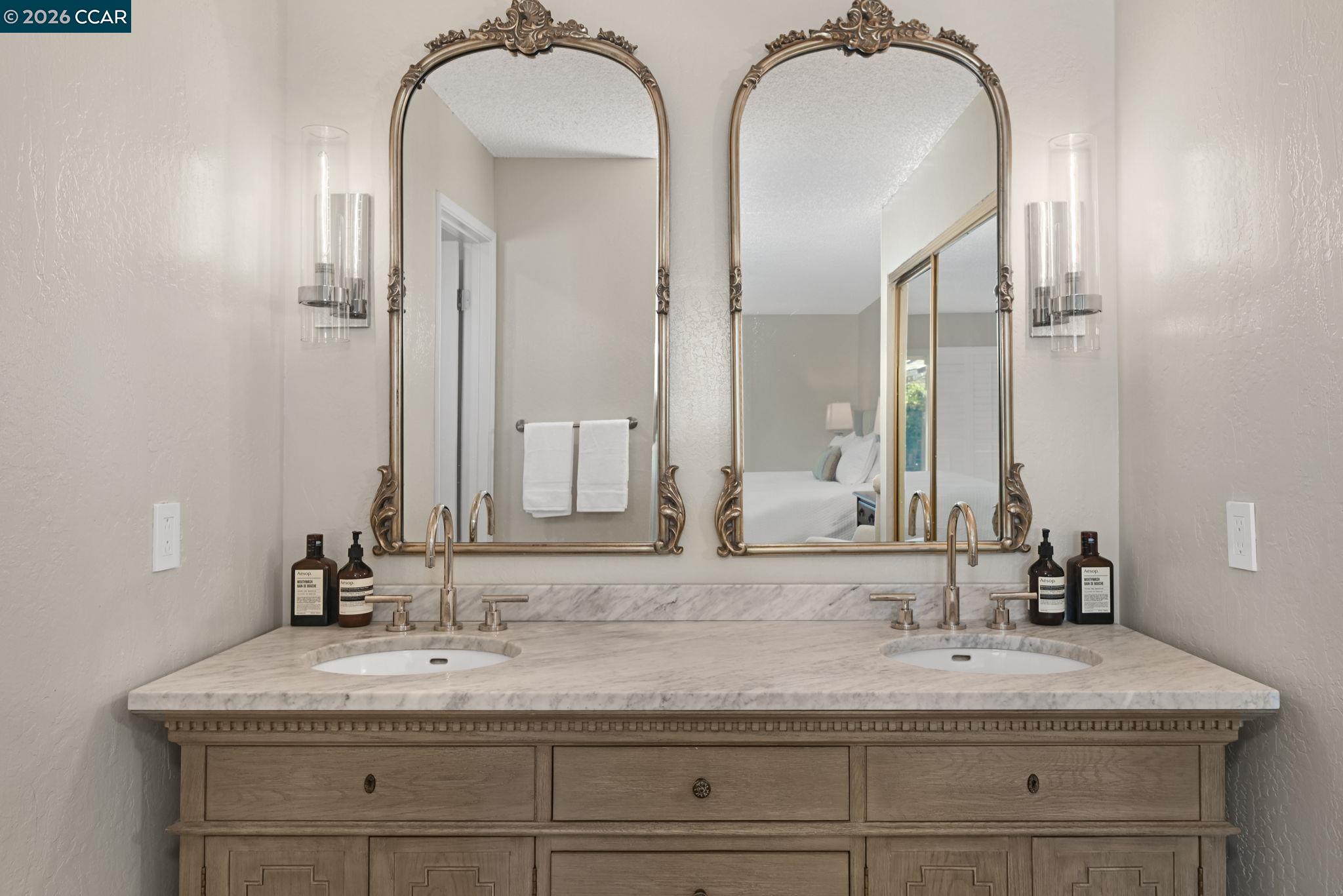 4151 Storey Lane Concord, CA 94518 - Photo 18 of 40 a bathroom with a sink and a mirror