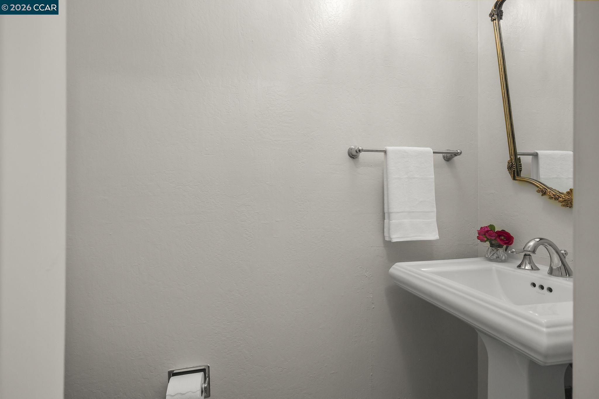 4151 Storey Lane Concord, CA 94518 - Photo 22 of 40 a bathroom with a sink and a mirror