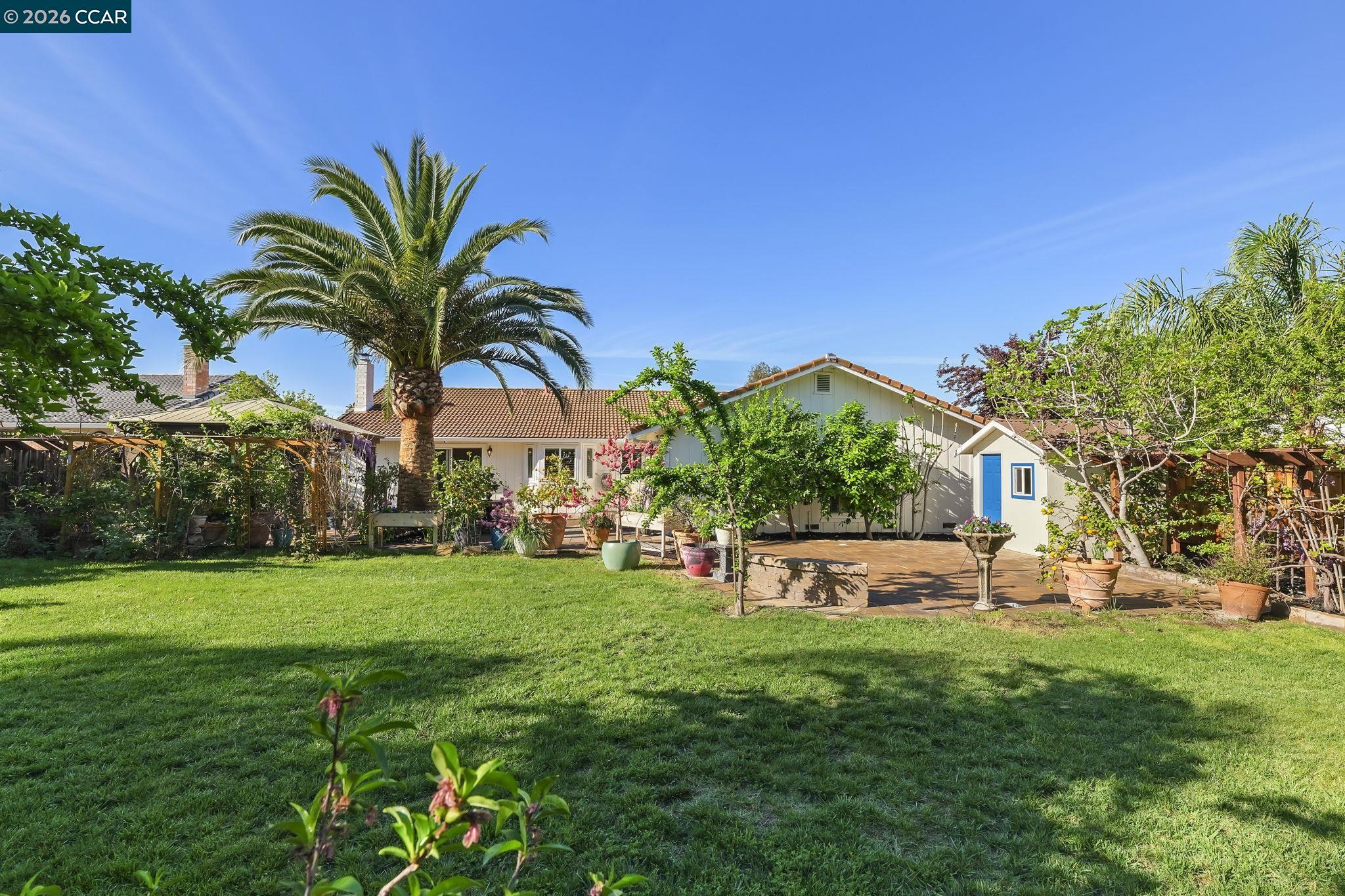 4151 Storey Lane Concord, CA 94518 - Photo 36 of 40 a view of a house with a backyard