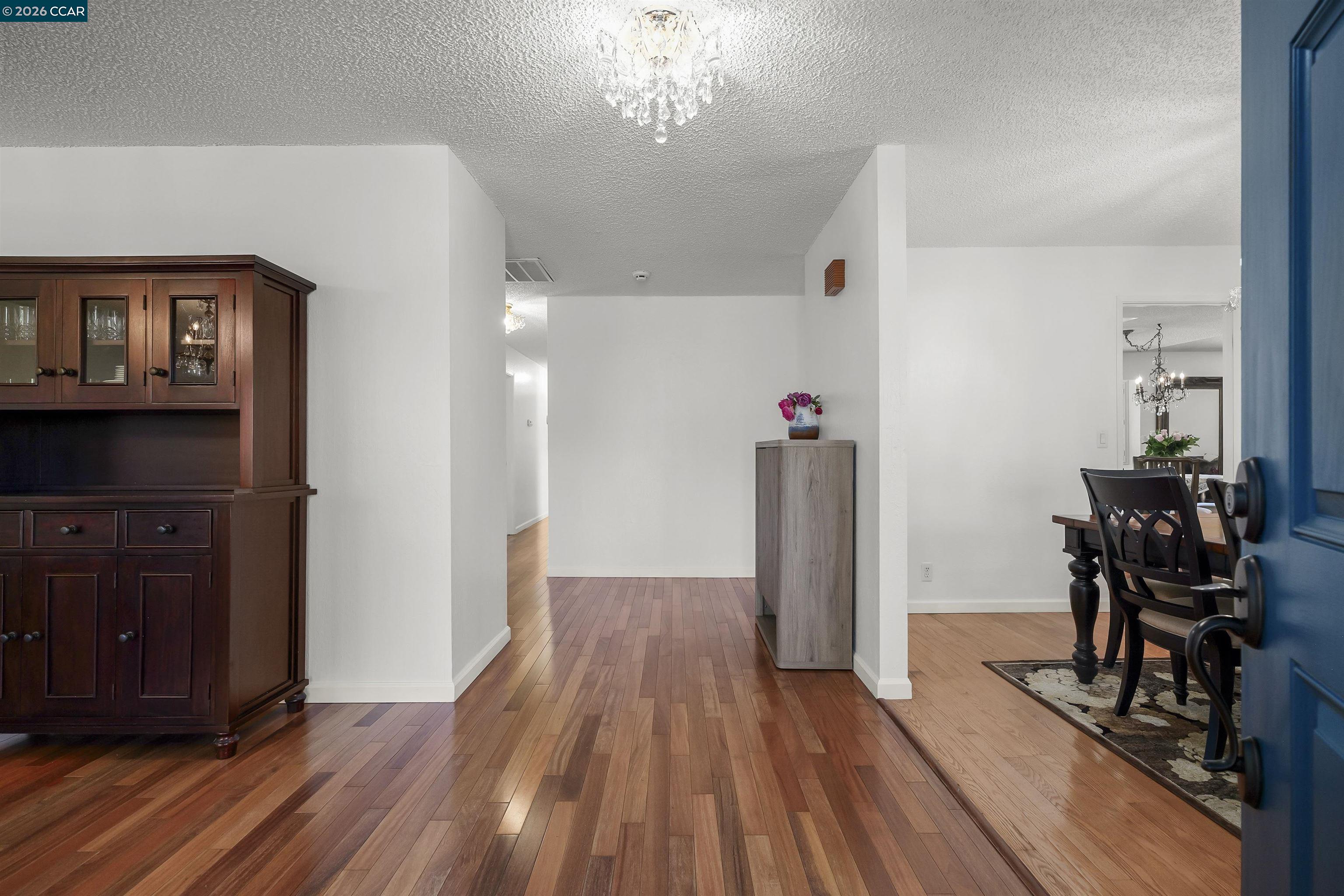 4151 Storey Lane Concord, CA 94518 - Photo 6 of 40 a view of a livingroom with furniture hardwood floor and a ceiling fan