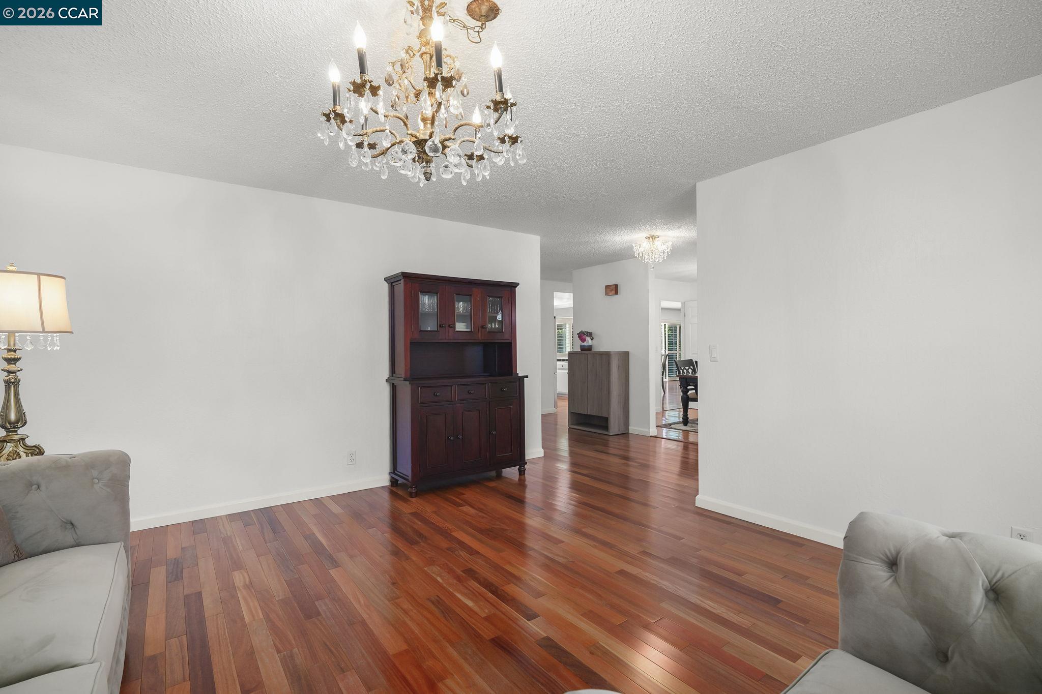 4151 Storey Lane Concord, CA 94518 - Photo 10 of 40 a view of livingroom with hardwood floor and hallway
