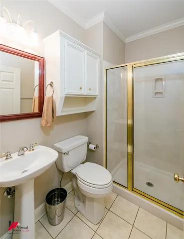 a kitchen with granite countertop white cabinets and stainless steel appliances