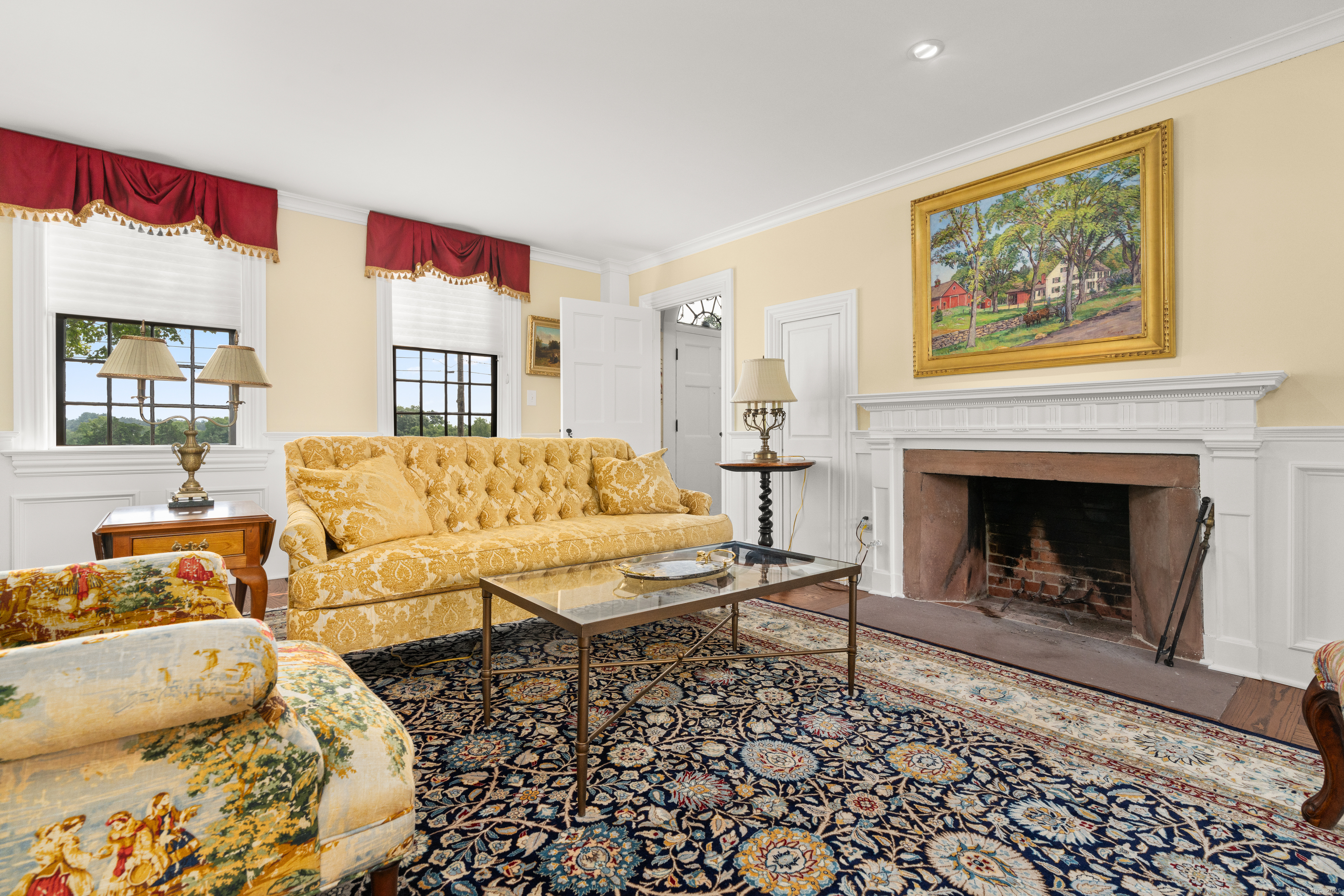 117 Elys Ferry Road Lyme, CT 06371 - Photo 12 of 40 a living room with furniture and a fireplace