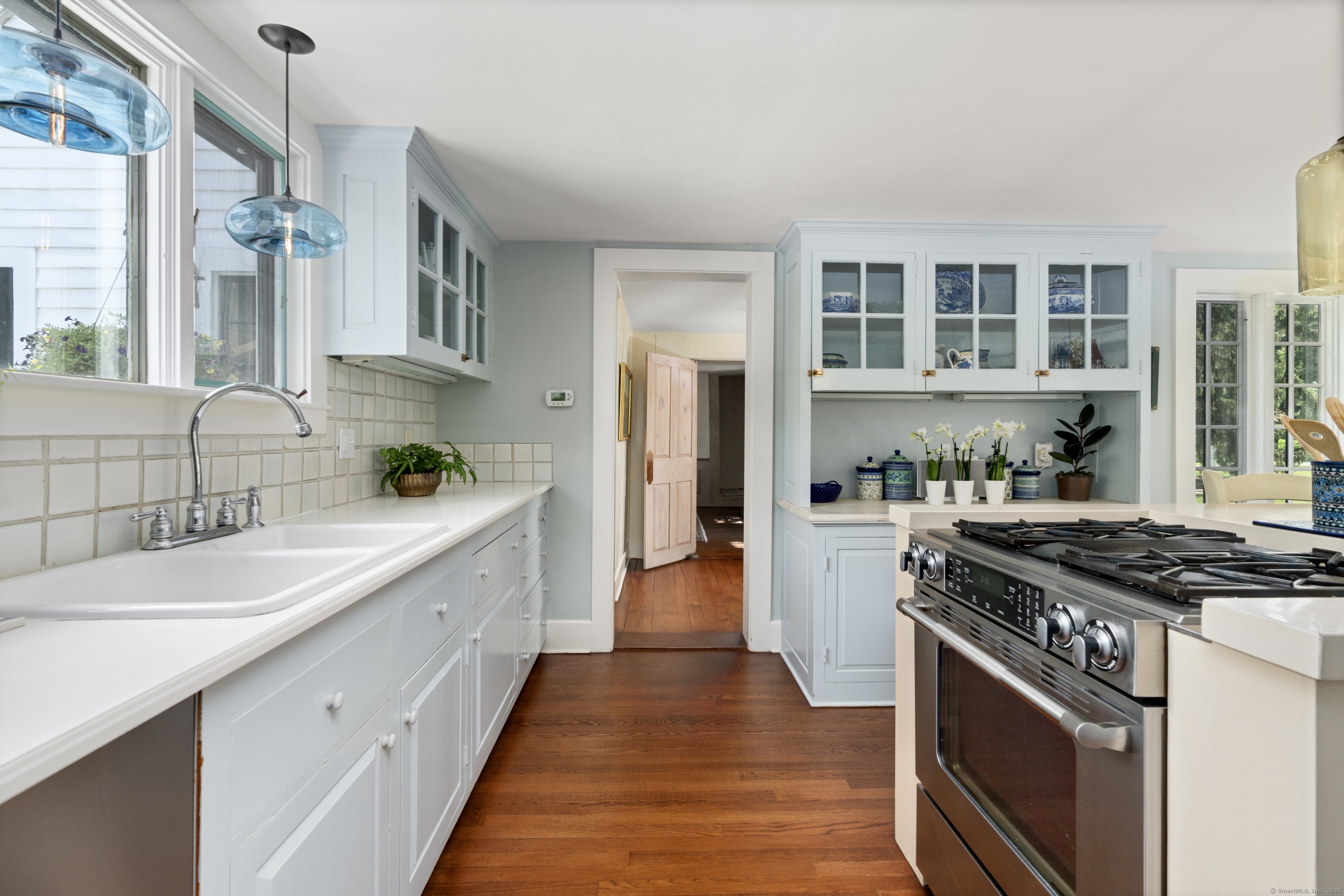 117 Elys Ferry Road Lyme, CT 06371 - Photo 16 of 40 a kitchen with stainless steel appliances granite countertop a sink stove and cabinets