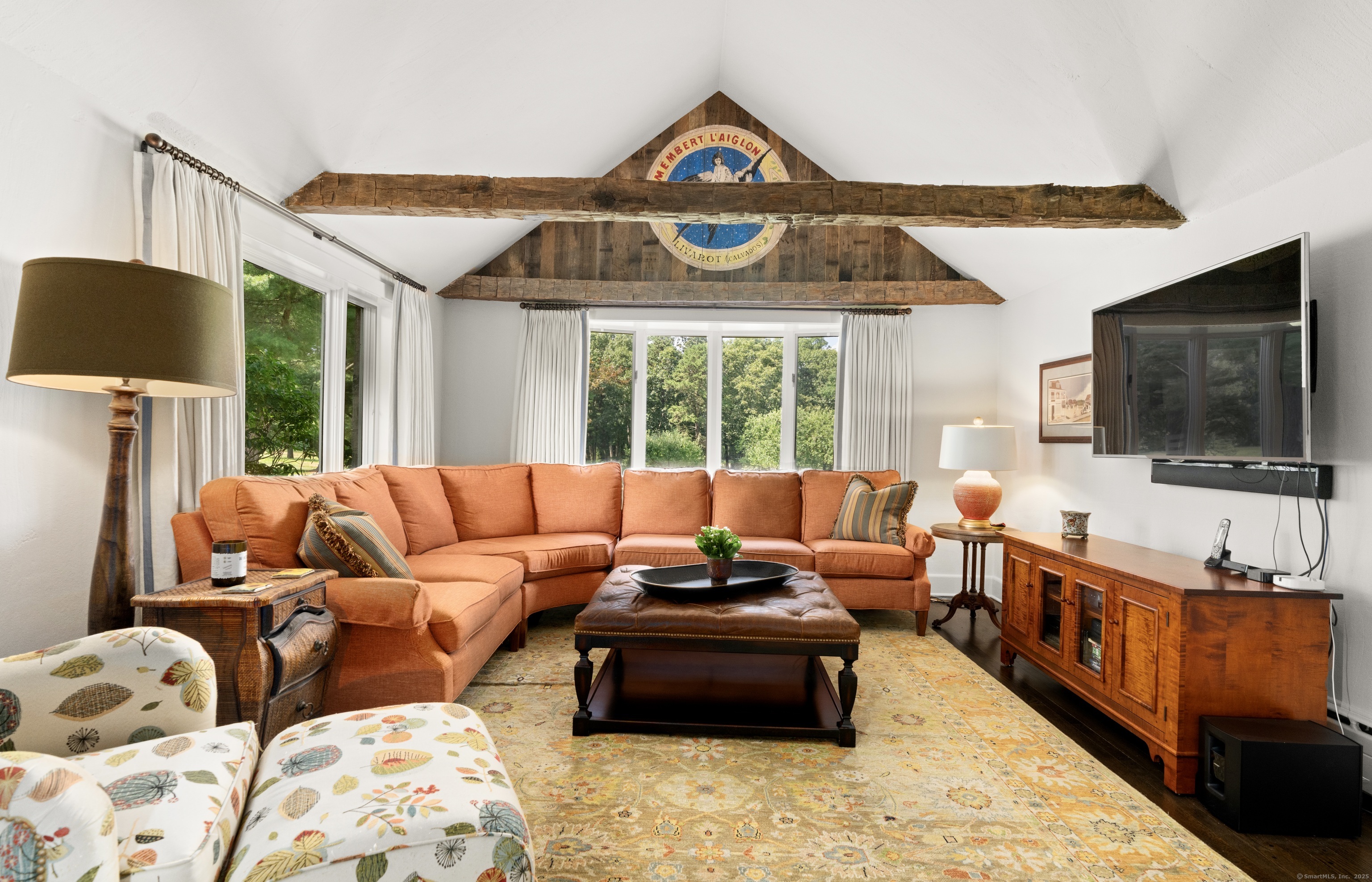 117 Elys Ferry Road Lyme, CT 06371 - Photo 17 of 40 a living room with furniture and a flat screen tv