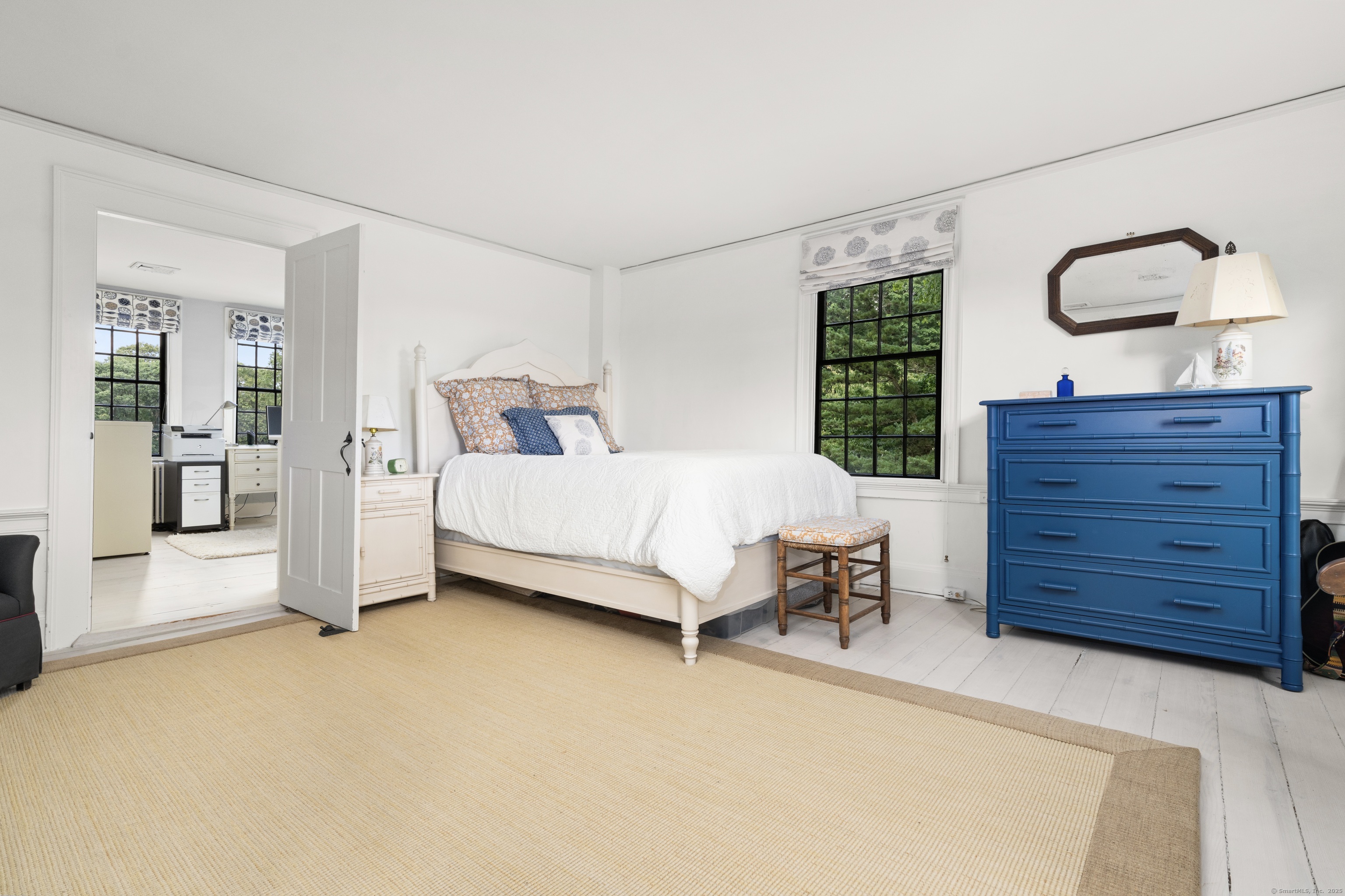 117 Elys Ferry Road Lyme, CT 06371 - Photo 21 of 40 a bedroom with a bed dresser and a large window