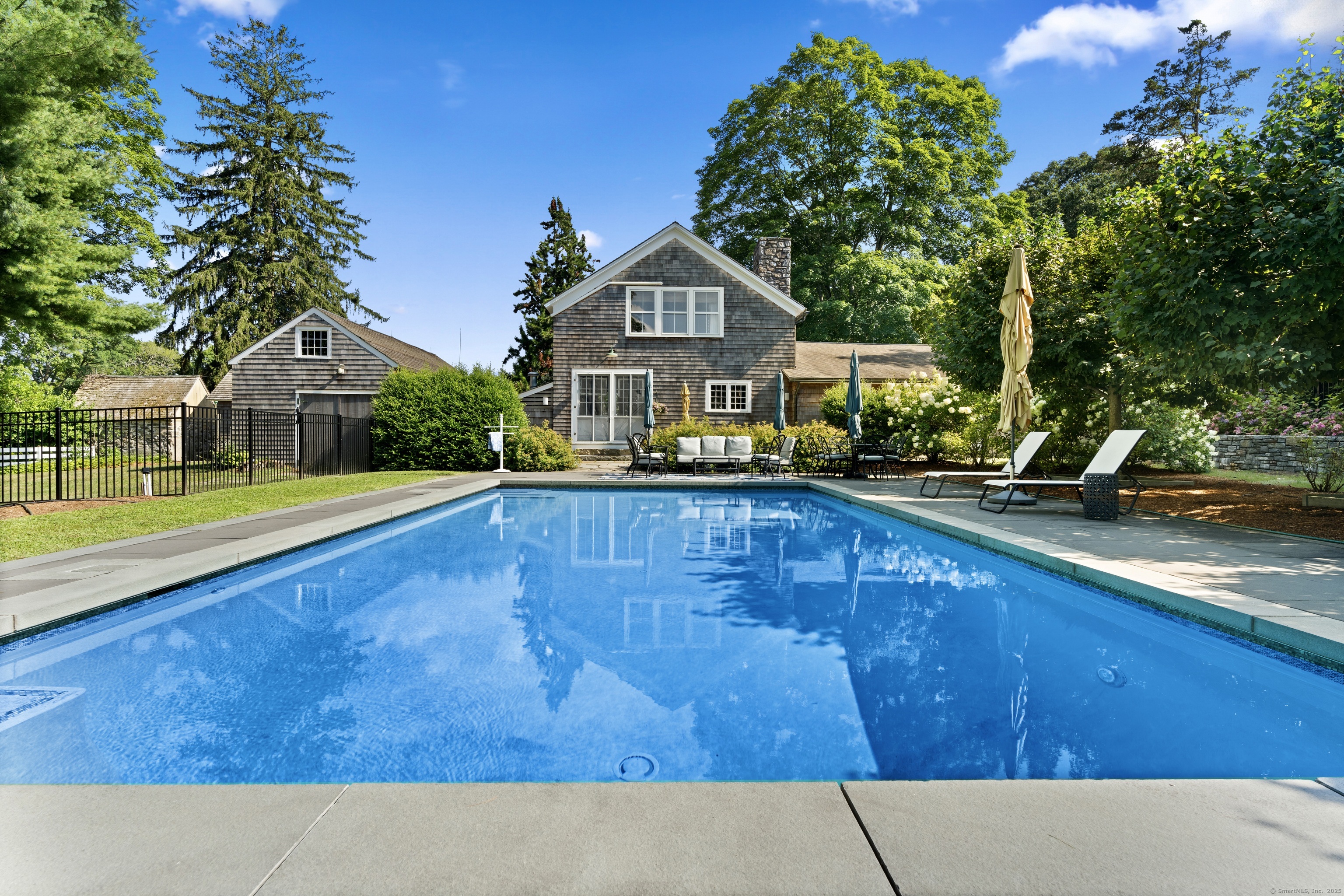 117 Elys Ferry Road Lyme, CT 06371 - Photo 30 of 40 a view of a house with a swimming pool