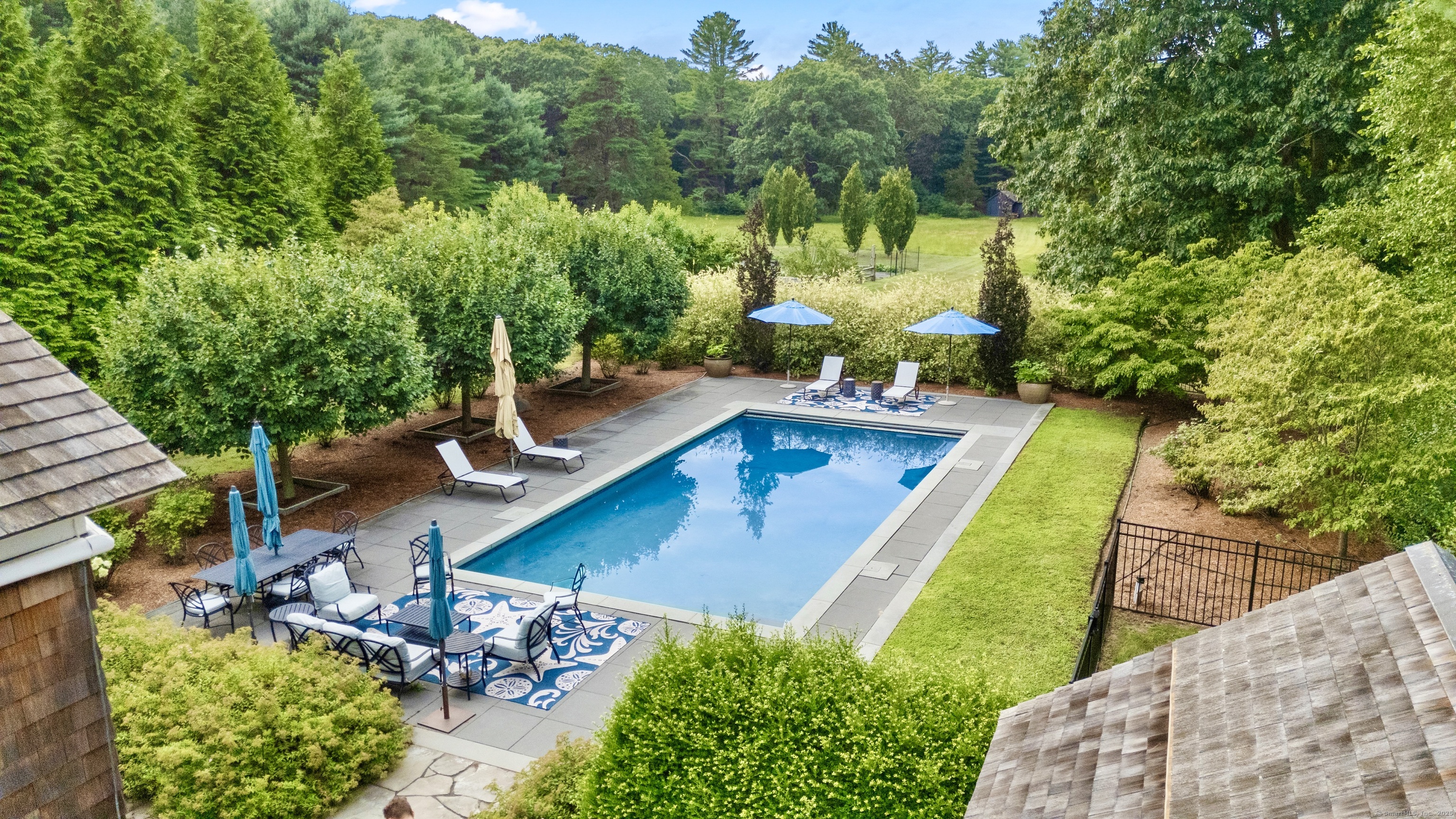 117 Elys Ferry Road Lyme, CT 06371 - Photo 31 of 40 a view of a swimming pool with a patio